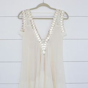 Elliatt ivory dress size small with vegan detail